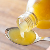 MIYABI Yuzu & Kombu Liquid concentrate poured onto a spoon
