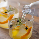 Yuzu & Kombu gin cocktail with juniper berries and orange peel