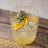 Yuzu & Kombu Liquid served with rosemary and orange
