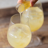 Pouring Yuzu & Kombu Liquid over ice